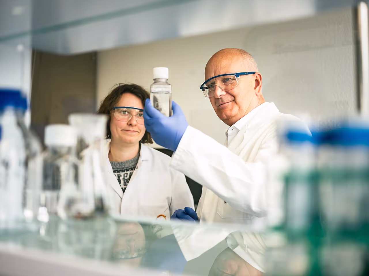 Two employees working in the lab